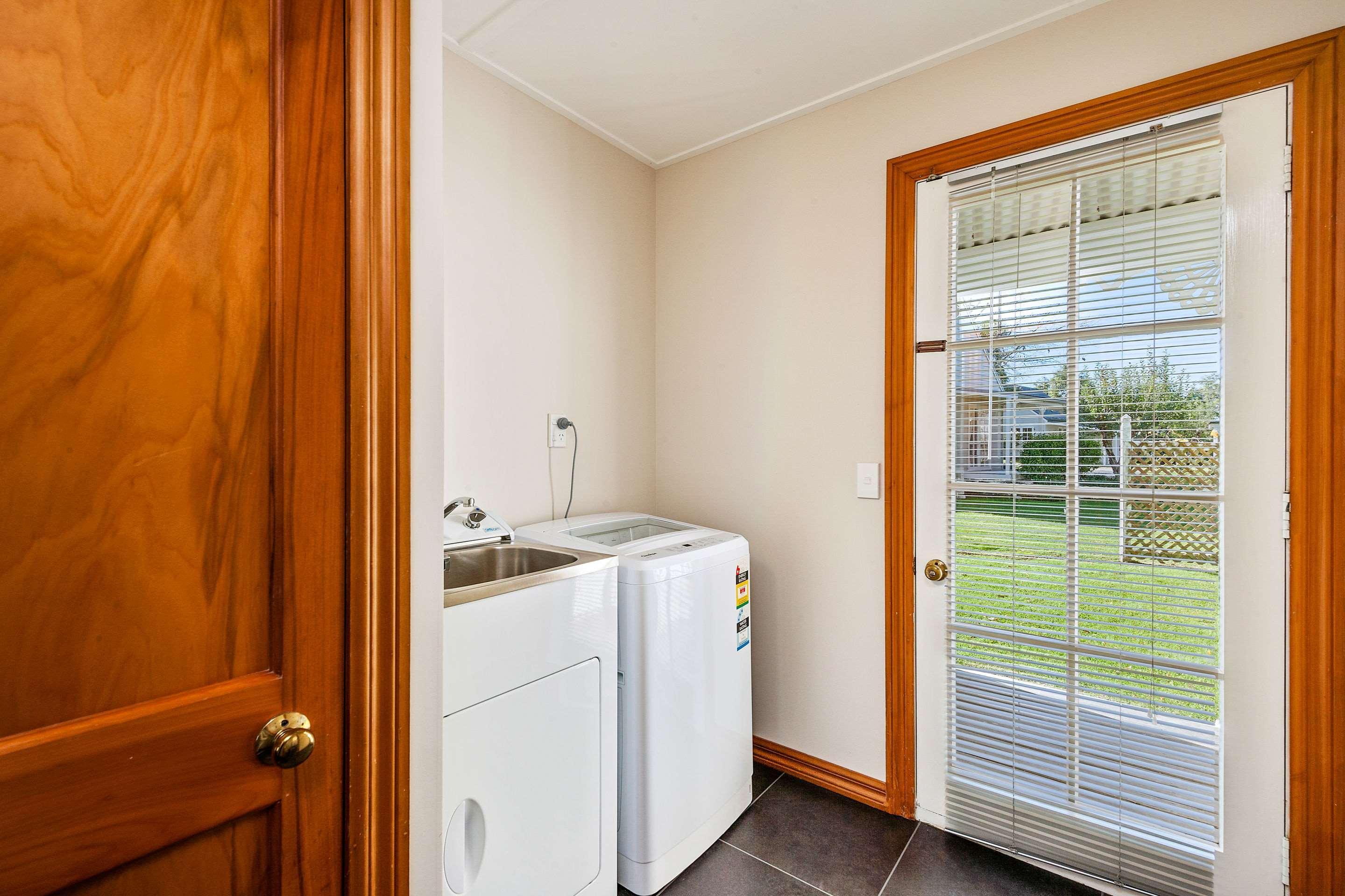 Huka Falls Resort Taupo Exterior photo A laundry room in a house