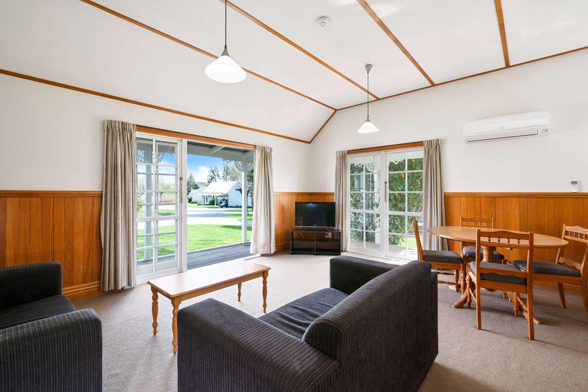 Huka Falls Resort Taupo Exterior photo Living area of a typical two bedroom apartment