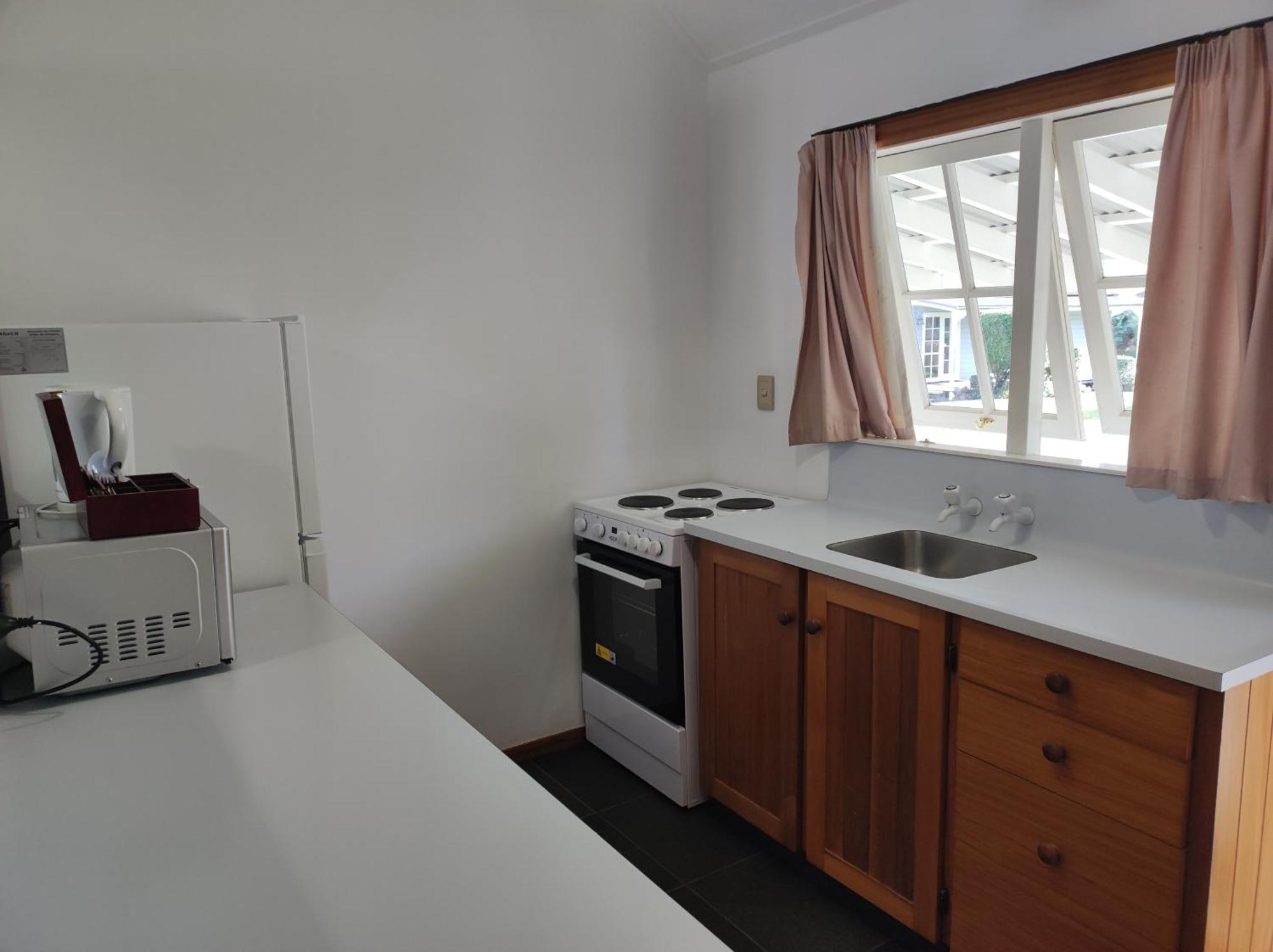 Huka Falls Resort Taupo Exterior photo A kitchen in a student flat